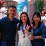 Mikhaella with her proud parents