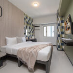 SR_Philippines_Manila_The Suites at TLM_Studio Exe_Bedroom 01-HR