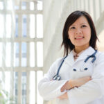 Southeast,Asian,Medical,Student.,Young,Medical,Doctor,Woman,Standing,On