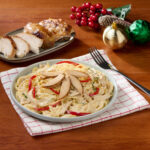 Roasted Chicken Carbonara, made with rich Del Monte Carbonara Style Spaghetti Sauce and sumptuous lechon manok